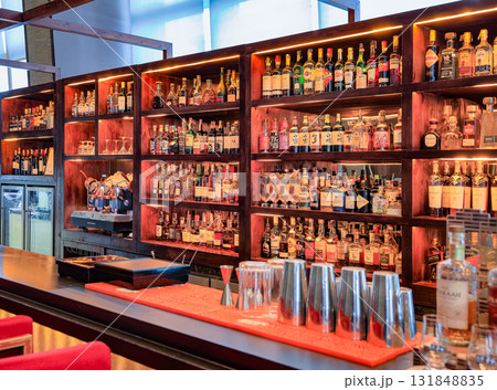 An assortment of high-class liquor in a luxury hotel bar. An assortment of high-class liquor in a luxury hotel bar. 131848835