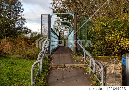 Pedestrian Footbridge Over the River Allan at Bridge of Allan Scotalnd in Autumn Pedestrian Footbridge Over the River Allan at Bridge of Allan Scotalnd in Autumn 131849038
