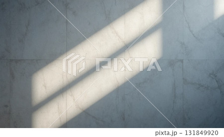 Light and Shadow Dance on a Marble Surface During Afternoon Sunlight in a Modern Interior Space Light and Shadow Dance on a Marble Surface During Afternoon Sunlight in a Modern Interior Space 131849920