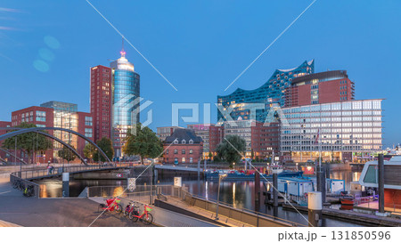 Jan Fedder Promenade day to night timelapse hyperlapse in Hamburg, Germany, a vibrant waterfront area. Jan Fedder Promenade day to night timelapse hyperlapse in Hamburg, Germany, a vibrant waterfront area. 131850596
