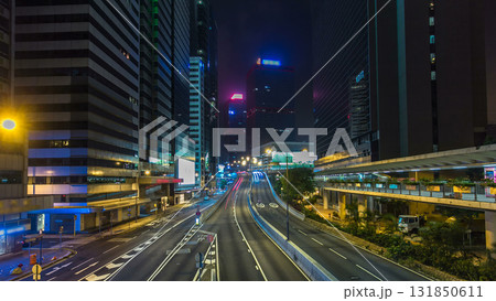 Hong Kong Business District with busy traffic timelapse at night. 131850611