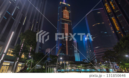 Night view hyperlapse of modern city in park with fountain and skyscrapers around. Time lapse. Hong Kong 131850646