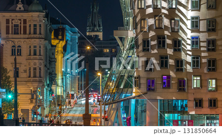 Traffic on the street near Dancing house in Prague timelapse, Czech republic. Modern architecture. Traffic on the street near Dancing house in Prague timelapse, Czech republic. Modern architecture. 131850664