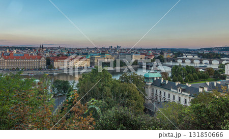 Evening sunset Panorama of Prague with Vltava river and Prague Bridges timelapse. 131850666