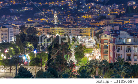 Evening aerial panorama of Nice day to night timelapse, France. Lighted Old Town little streets and Massena square after sunset Evening aerial panorama of Nice day to night timelapse, France. Lighted Old Town little streets and Massena square after sunset 131850687
