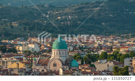 Synagogue of Florence timelapse with green copper dome rising above surrounding suburban housing with green hillside Synagogue of Florence timelapse with green copper dome rising above surrounding suburban housing with green hillside 131850727