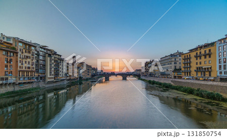 Cityscape view on Arno river with famous Holy Trinity bridge timelapse on the sunset in Florence 131850754