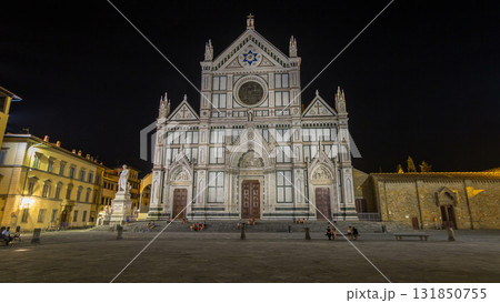 Tourists on Piazza di Santa Croce at night timelapse hyperlapse with Basilica di Santa Croce Basilica of the Holy Cross in Florence city. Tourists on Piazza di Santa Croce at night timelapse hyperlapse with Basilica di Santa Croce Basilica of the Holy Cross in Florence city. 131850755