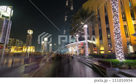 Walking area near the Dubai Fountain at night, UAE timelapse hyperlapse 131850954