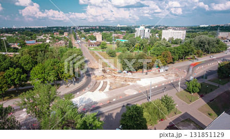 Road construction site with tram tracks repair and maintenance aerial timelapse. Road construction site with tram tracks repair and maintenance aerial timelapse. 131851129
