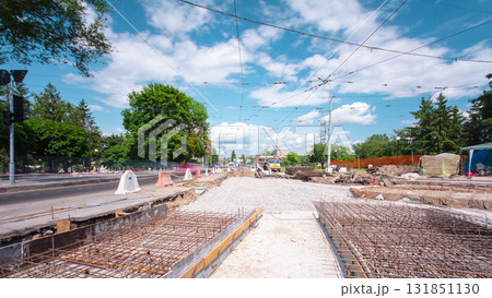 Road construction site with tram tracks repair and maintenance timelapse. Road construction site with tram tracks repair and maintenance timelapse. 131851130