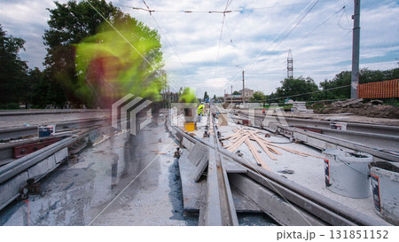 Road construction site with tram tracks repair and maintenance timelapse hyperlapse. Road construction site with tram tracks repair and maintenance timelapse hyperlapse. 131851152