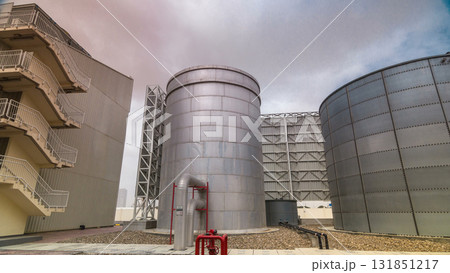 Two silver Water Tanks with fence timelapse hyperlapse Two silver Water Tanks with fence timelapse hyperlapse 131851217