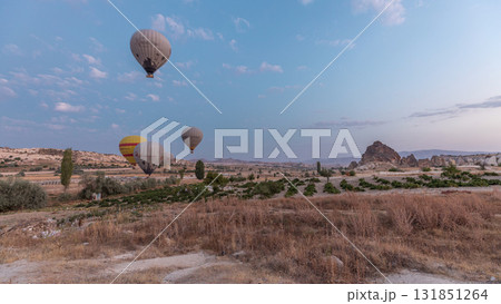 Beautiful colorful hot air balloons take off and flying in clear morning sky timelapse in Cappadocia, Turkey 131851264