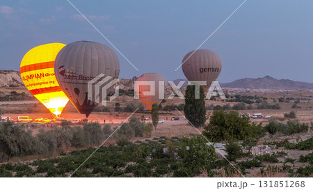 Beautiful colorful hot air balloons take off and flying in clear morning sky timelapse in Cappadocia, Turkey 131851268