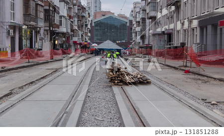 Tram after their installation and integration into concrete plates on the road timelapse. Tram after their installation and integration into concrete plates on the road timelapse. 131851288