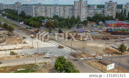 Aerial view of large road construction site with several industrial machines timelapse. 131851321
