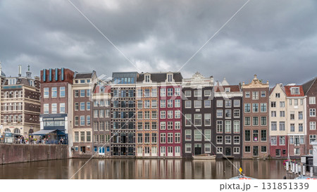 Hyperlapse of colorful Canal Houses on Damrak in evening light. Amsterdam, Netherlands Hyperlapse of colorful Canal Houses on Damrak in evening light. Amsterdam, Netherlands 131851339