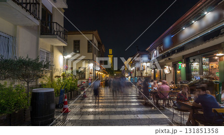 The walk along historic street of Kaleici timelapse hyperlapse with the view on the broken minaret of Kesik Minare Camii mosque in Antalya. 131851358