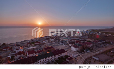 Aktau city on the shore of the Caspian Sea at sunset timelapse. Kazakhstan. Aktau city on the shore of the Caspian Sea at sunset timelapse. Kazakhstan. 131851477