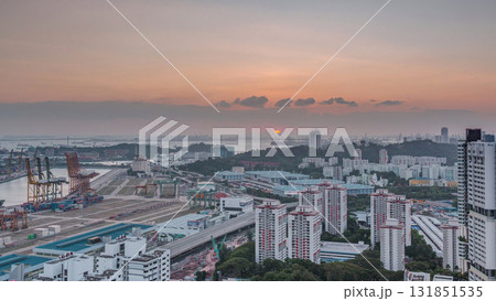 Sunset over commercial port of Singapore timelapse. Sunset over commercial port of Singapore timelapse. 131851535