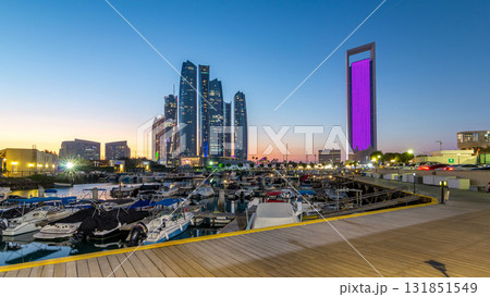 Al Bateen marina Abu Dhabi day to night timelapse with modern skyscrapers on background 131851549