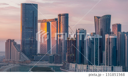 Buildings on Al Reem island in Abu Dhabi timelapse from above. 131851568