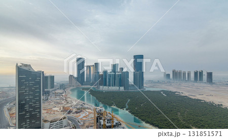 Buildings on Al Reem island in Abu Dhabi timelapse from above Buildings on Al Reem island in Abu Dhabi timelapse from above 131851571