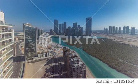 Buildings on Al Reem island in Abu Dhabi timelapse from above. Buildings on Al Reem island in Abu Dhabi timelapse from above. 131851614