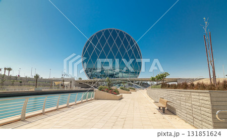 Circular skyscraper Aldar Headquarters Building timelapse hyperlapse in Abu Dhabi, UAE. Circular skyscraper Aldar Headquarters Building timelapse hyperlapse in Abu Dhabi, UAE. 131851624