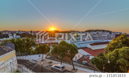 Sunrise over Lisbon aerial cityscape skyline timelapse from viewpoint of St. Peter of Alcantara, Portugal. Sunrise over Lisbon aerial cityscape skyline timelapse from viewpoint of St. Peter of Alcantara, Portugal. 131851633