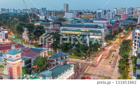 Street traffic near the fire station of Singapore day to night aerial timelapse. 131851662