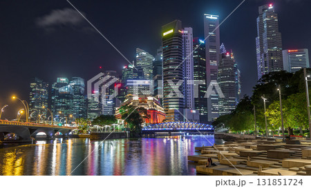 Business Financial Downtown City and Skyscrapers Tower Building at Marina Bay night timelapse hyperlapse, Singapore 131851724