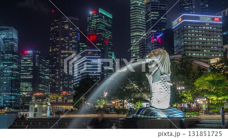 The Merlion fountain and Singapore skyline night timelapse hyperlapse. 131851725