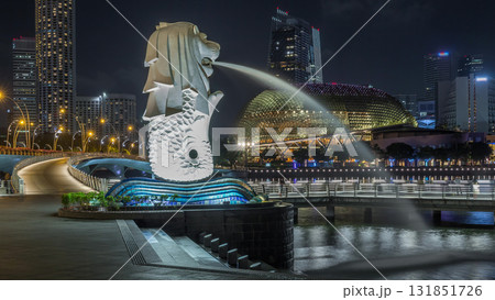 The Merlion fountain and Singapore skyline night timelapse hyperlapse. 131851726
