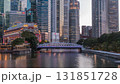 Singapore skyscrapers skyline with white Anderson Bridge near esplanade park day to night timelapse. 131851728