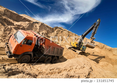 Excavator Loading Dumper Truck Excavator Loading Dumper Truck 131851745