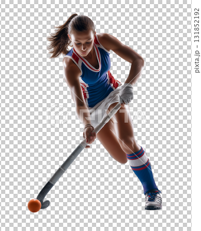 Female Field Hockey Player Striking Orange Ball 131852192