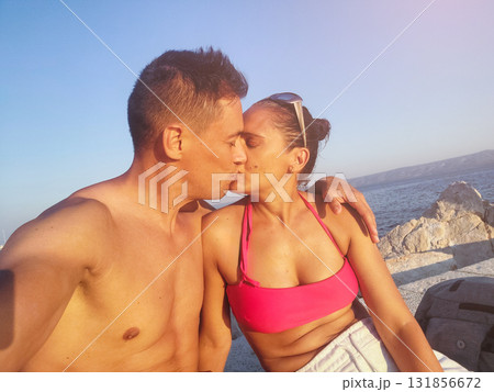 Couple kissing on Brac Island during summer vacation 131856672