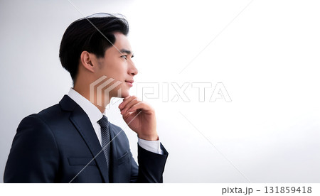 白い背景に浮かぶビジネスマンの考える横顔「AI生成画像」 白い背景に浮かぶビジネスマンの考える横顔「AI生成画像」 131859418