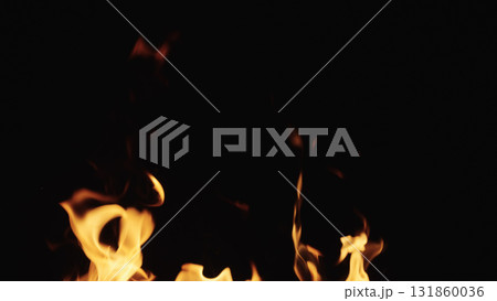 fire flames of campfire over black background, for overlay 131860036