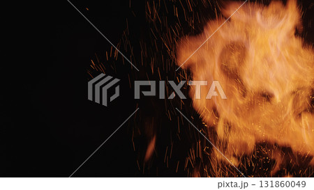 explosive fire flames of campfire over black background, for overlay explosive fire flames of campfire over black background, for overlay 131860049