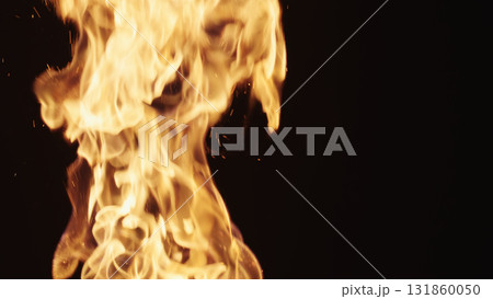 explosive fire flames of campfire over black background, for overlay 131860050