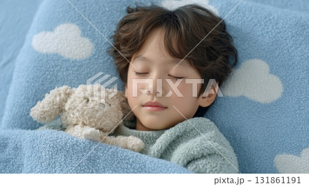 Little Korean Boy Cuddling Plush Toy Sleeping Under Sky Blue Blanket On Cloud Themed Bedding 131861191