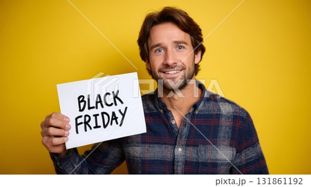 Male Individual Holding Promotional Announcement Placard Against Bold Yellow And Black Background 131861192