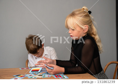 Children Playing Cards Table Game Fun Children Playing Cards Table Game Fun 131861239