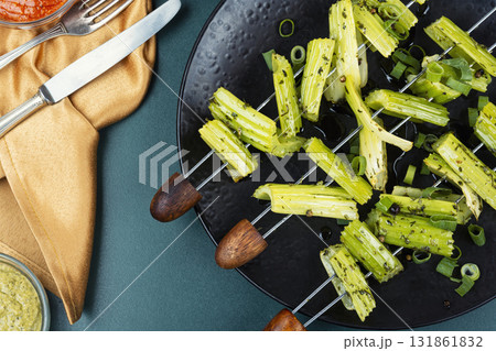Vegetable celery skewers arrayed on a platter. 131861832