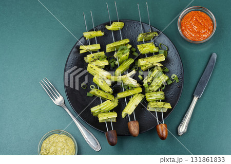 Vegetable celery skewers arrayed on a platter. Vegetable celery skewers arrayed on a platter. 131861833