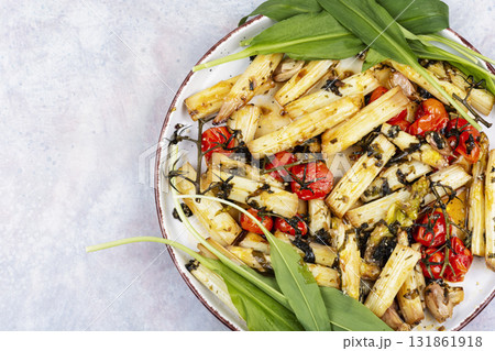 Roasted Asparagus with tomatoes and wild garlic. Roasted Asparagus with tomatoes and wild garlic. 131861918