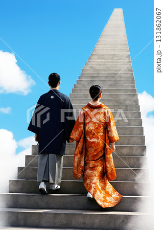 天空に続く階段を登る新郎新婦 天空に続く階段を登る新郎新婦 131862067
